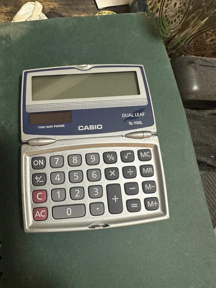 CASIO SL-100L Solar Calculator with Folding Hard Case