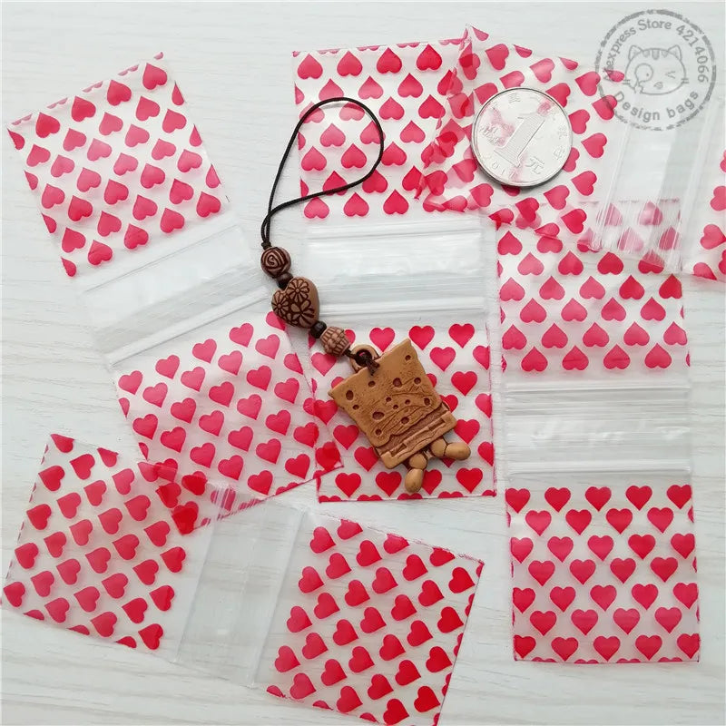 50-100pcs Mini Reclosable Storage Baggies - 1.75" Zip Craft Bags (Heart Print)
