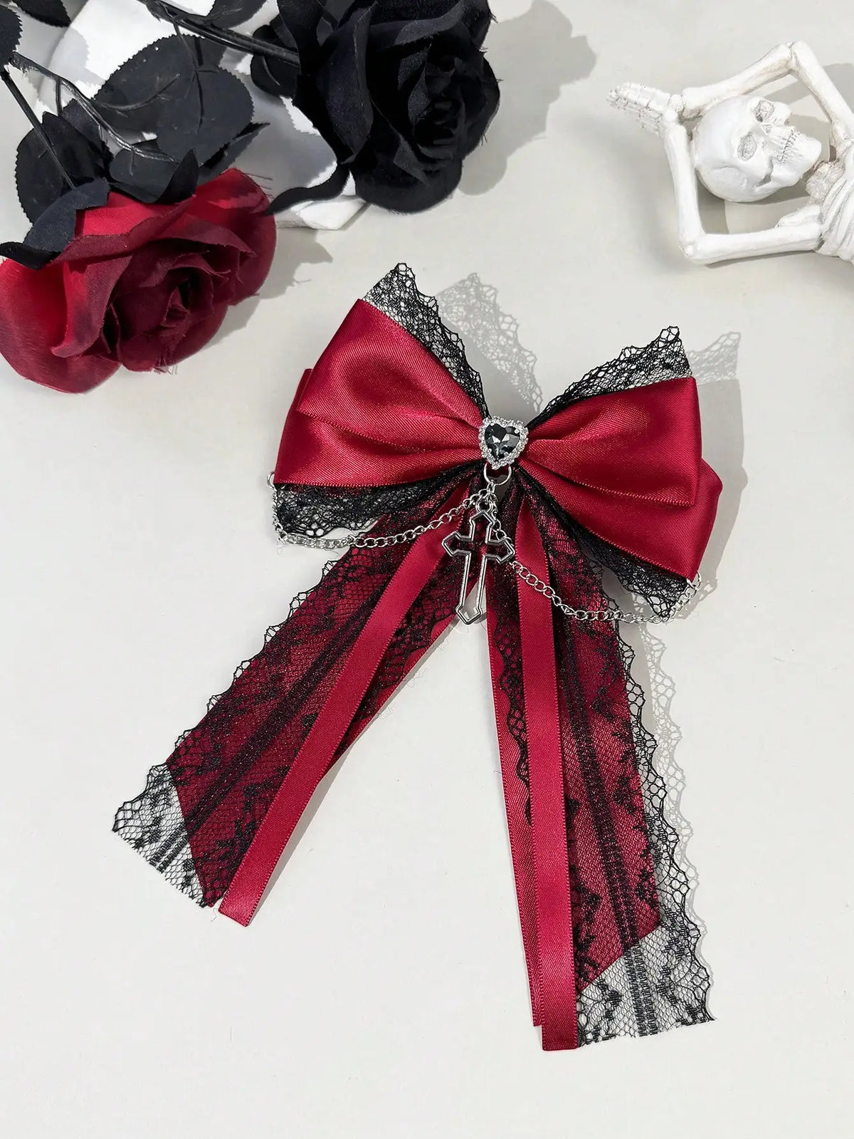 A delicate dark gothic-style lace ribbon bow cross decorated hair accessory hair clip for women, suitable for any occasion