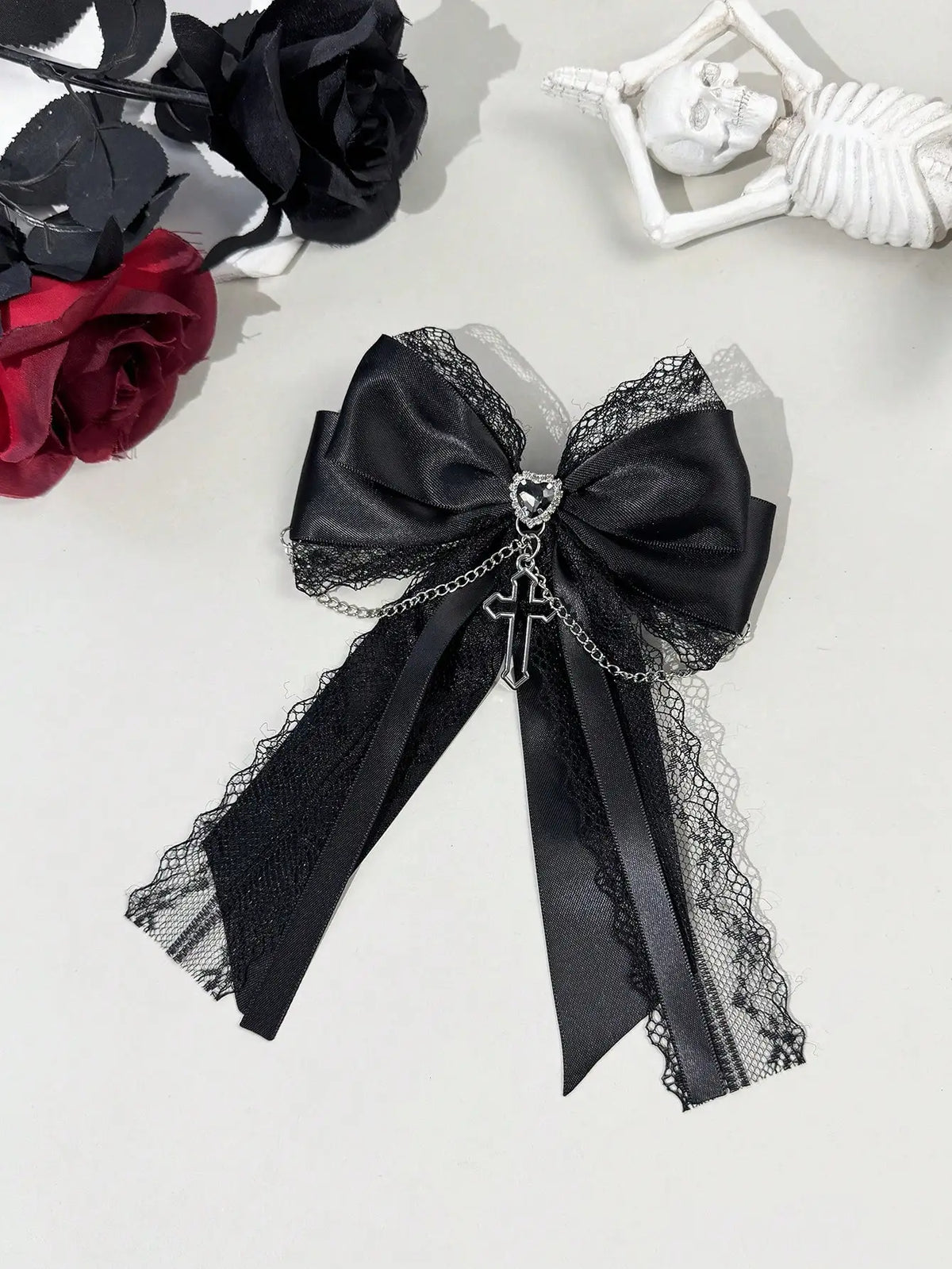 A delicate dark gothic-style lace ribbon bow cross decorated hair accessory hair clip for women, suitable for any occasion