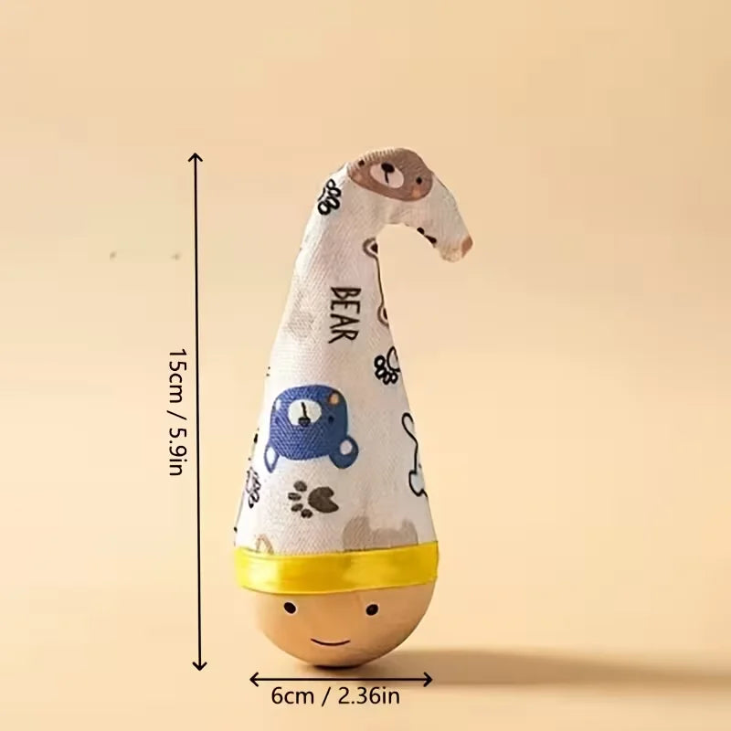 A cartoon-printed cat figurine doll toy. The sturdy wooden base provides a platform for the cat to exercise and play.
