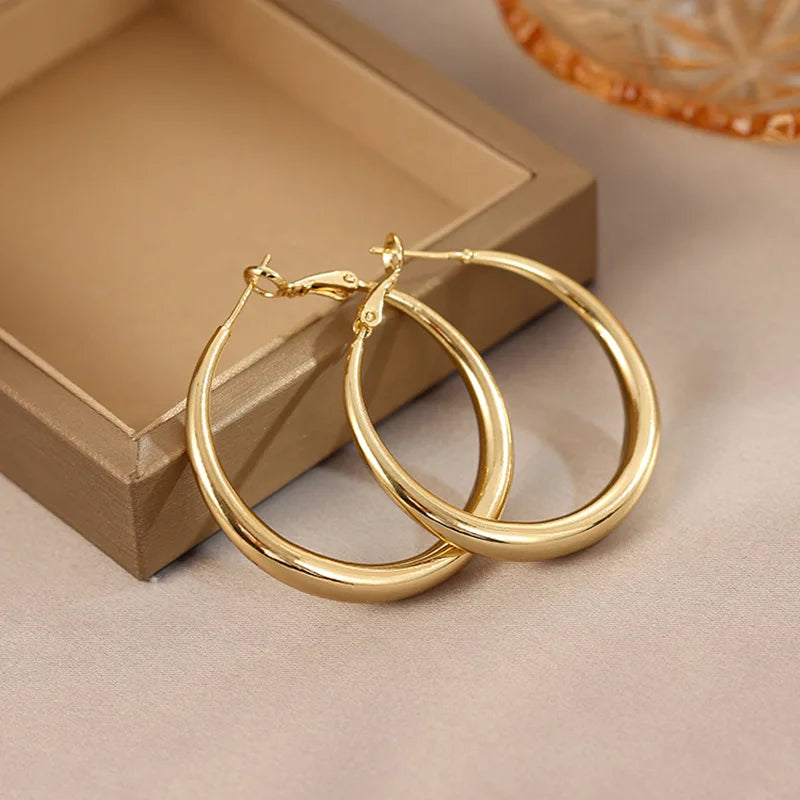 Big Circle Hoop Earrings — Gold Tone C-Shaped Statement Hoops