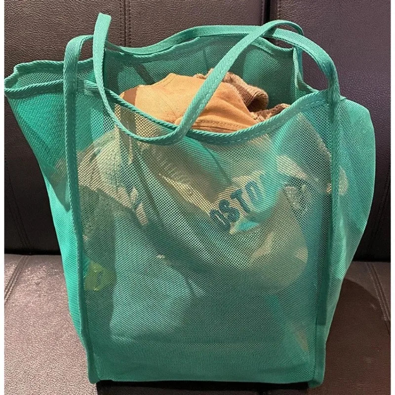 New transparent mesh shoulder bag, stylish and lightweight, with ample capacity, versatile for shopping, beach bag.