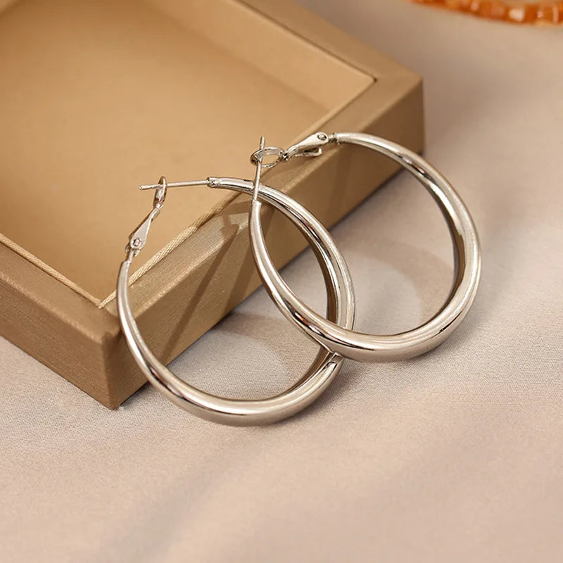 Big Circle Hoop Earrings — Gold Tone C-Shaped Statement Hoops