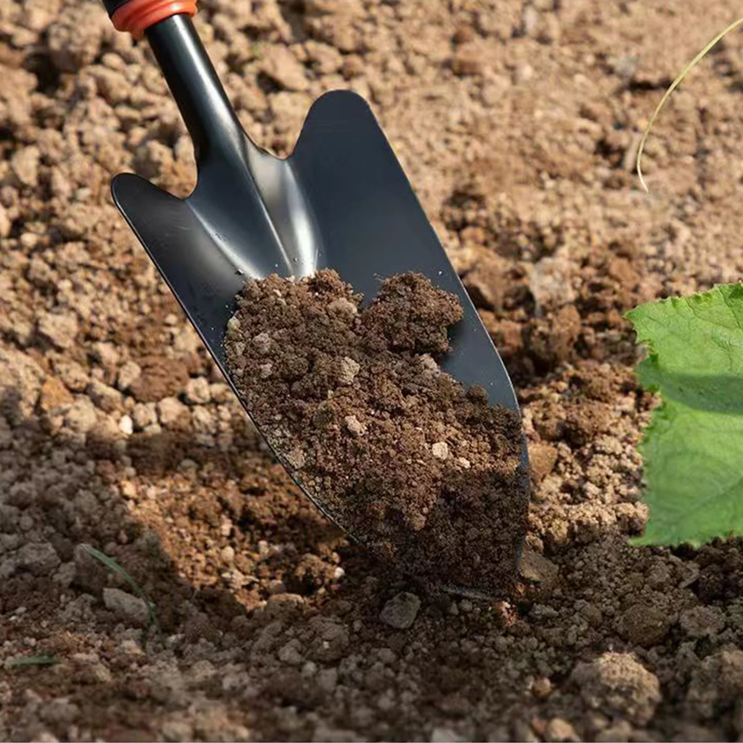 Metal Garden Trowel with Ergonomic Black Handle and Orange Trim - Perfect Tool for Planting Flowers and Vegetables
