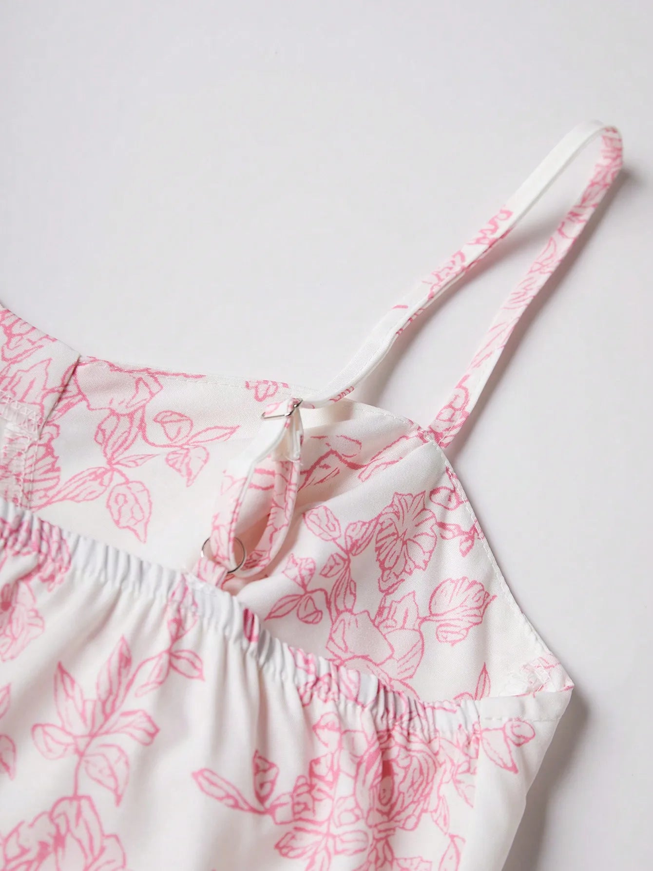 Elegant Pink Floral Print Dress with Thin Straps and a Flared Waist
