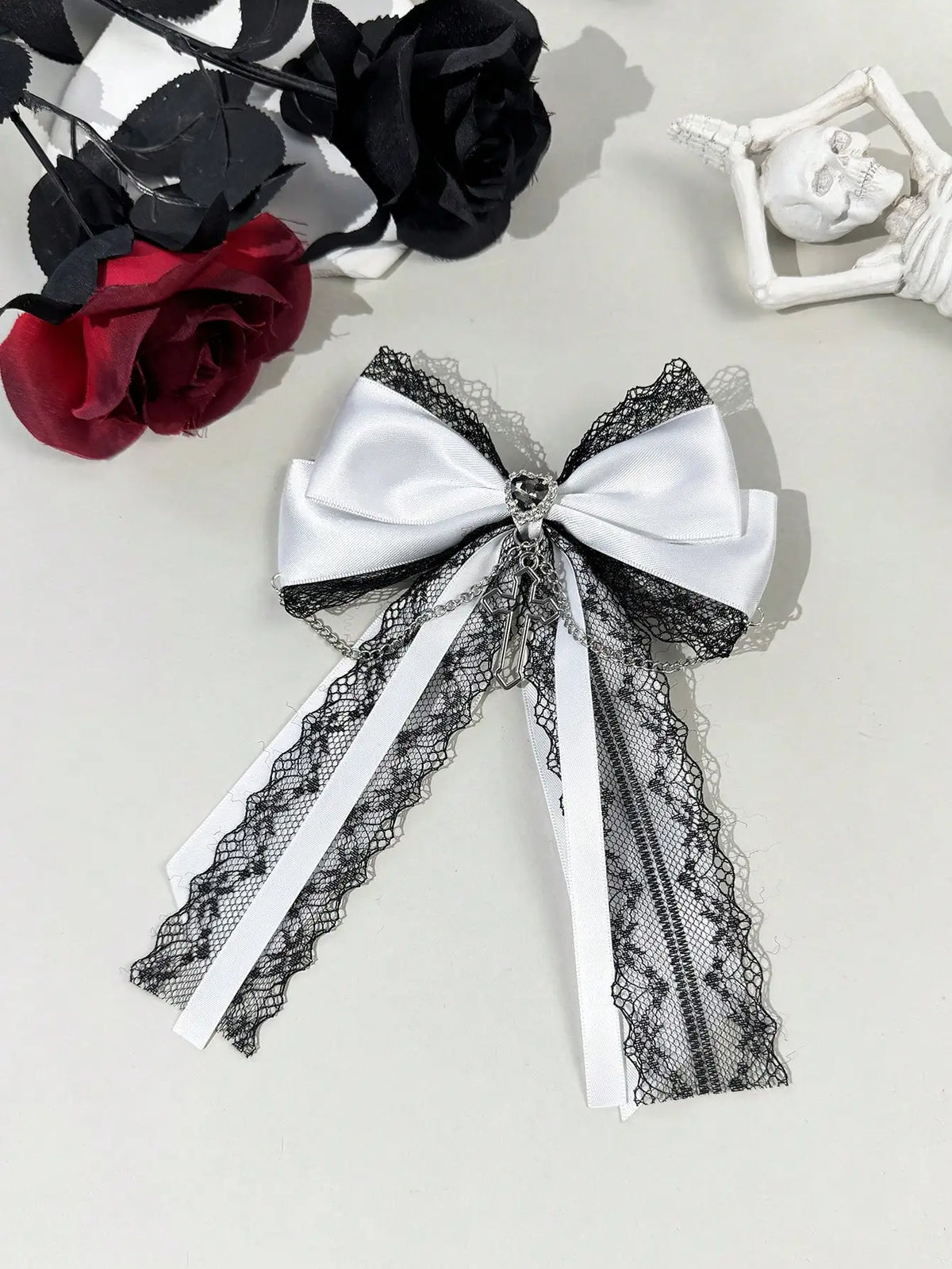 A delicate dark gothic-style lace ribbon bow cross decorated hair accessory hair clip for women, suitable for any occasion
