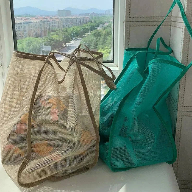 New transparent mesh shoulder bag, stylish and lightweight, with ample capacity, versatile for shopping, beach bag.