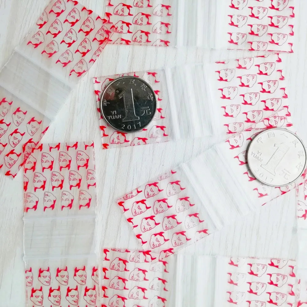 100pcs Mini Reclosable Storage Baggies - 1.25" Zip Craft Bags (Red Print)