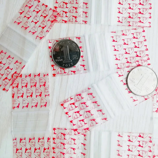 100pcs Mini Reclosable Storage Baggies - 1.25" Zip Craft Bags (Red Print)